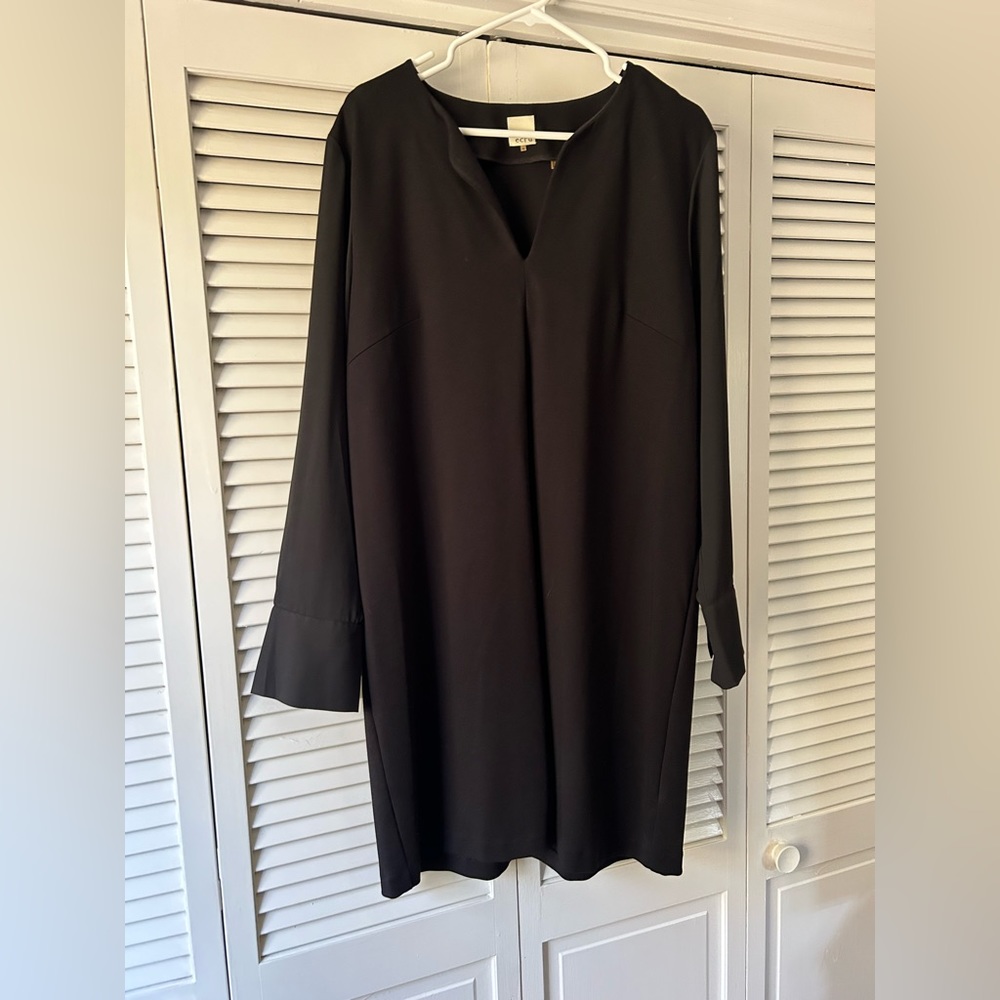 Black long sleeve knee length dress